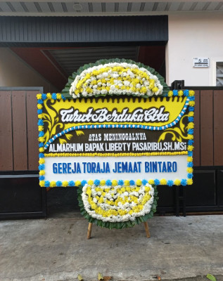 Papan Bunga Duka di Inuman